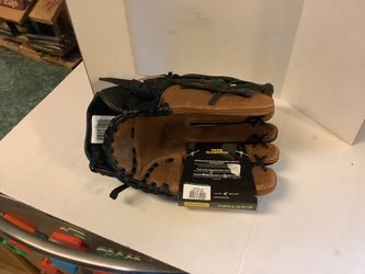 Easton Prime bk/brn softball glove, 12.5” brand new,  model PSP125, oil stained, with tags, wide heel and deep pocket right hand throw, original tags.
