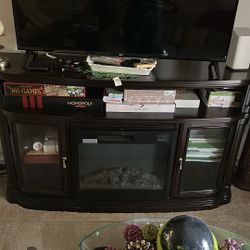 Entertainment/TV Stand With Fire Place.