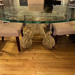 Round Glass Dining Table with Ornate Base
