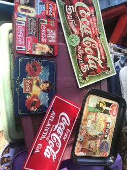 Collectible Coca-Cola tins everything goes for $50
