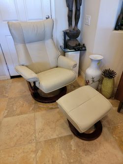 Benchmaster tan recliner with storage ottoman