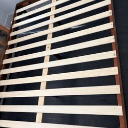 SOLID WOOD QUEEN SIZED BED FRAME. 