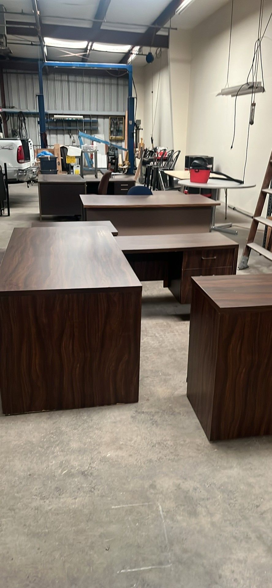 desk, table and cabinets.