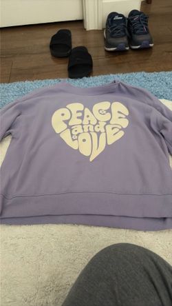 Purple sweater that says “peace and love” XL 14-16 for kids