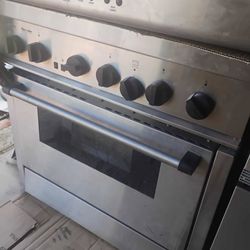 Thermador stainless steel 6 burner Propane Stove with Vent hood