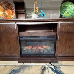 Beautiful cabaret media fireplace in vintage oak with 5 realistic colors of flames 78” inch long