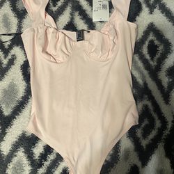 baby pink bodysuit 