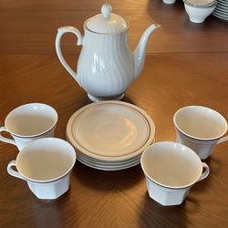 4 Tea Cups W/ Saucers And Tea Pot