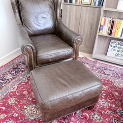 Dark brown leather chair and ottoman