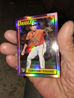 2025 Topps Update 35th Anniversary Tomoyuki Sugano #U90-18 Rookie Card featuring the iconic 1990 Topps design. Purple Border Parallel with Rainbow Hol