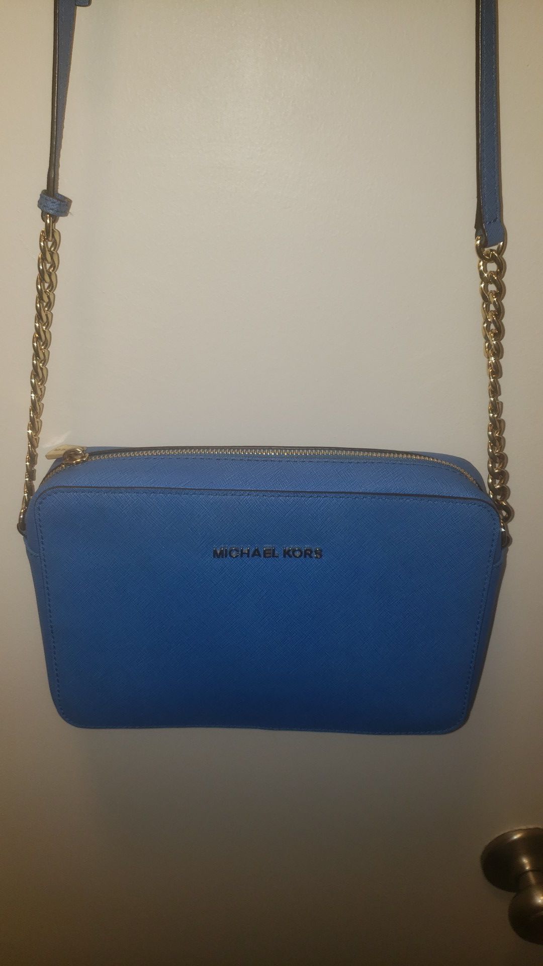 Michael Kors small blue purse with adjustable strap