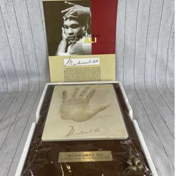 Muhammad Ali Silk Road Hand Print   1992 Hasbro action figure,   Ali’s Sports Illustrated Video