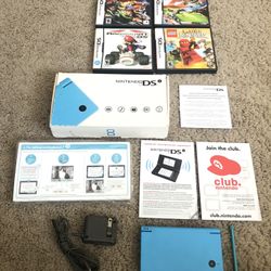Nintendo DSi Light Blue Complete w/ Original Box manual & Inserts with 4 games 