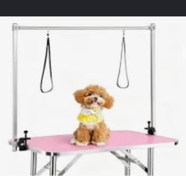 Dog grooming poles that grab on any table.