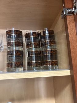 Mid-Century Modern tortoiseshell and gold mesh highball glasses
