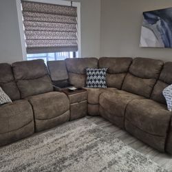 Lazyboy 4  piece sectional,   one end is electric, one end manual. Brown with cup holders & storage.