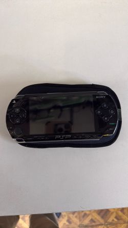 PSP 1001 black console comes with charger ( pickup at 92024 Escondido swap meet)