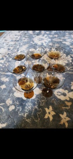 set of amber-colored, hand-blown martini glasses