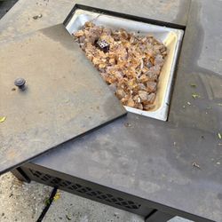 Outdoor fire pit. Uses propane