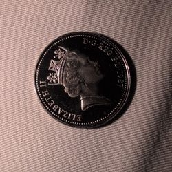 United Kingdom 5 Pence coin. ($7)