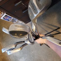 Well Used Set Of Golf Clubs