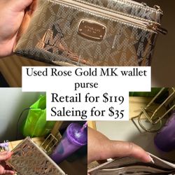 Used Micheal Kors Rose Gold Wrist Purse