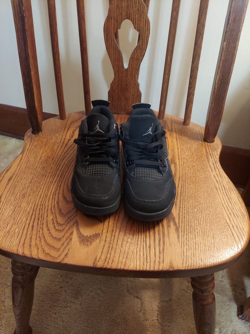 All Black Jordan 4