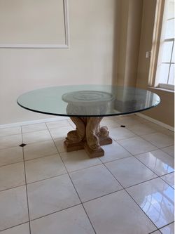 Thick Glass dining table with stone base