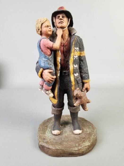 Michael Garman Sculpture – Firefighter Holding Child, Black and Yellow