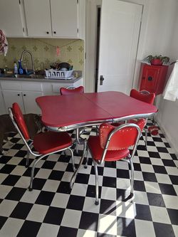 Red chrome and formica table with matching antique breadbox