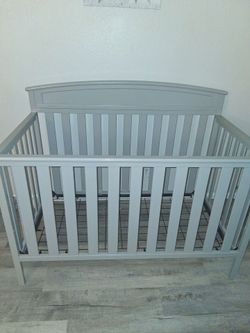 Delta Children's Gray baby crib