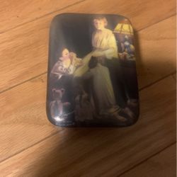 Music box that plays the evening prayers by Norman Rockwell