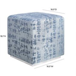 Two Blue Patterned  Ottomans 