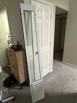 Sliding glass pet door.
