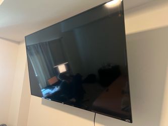 LIKE NEW 65 INCH SMART TV WITH MOUNT AND LEGS