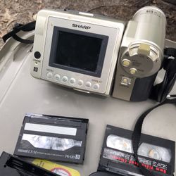 Very Nice Short Camcorder With Remote Battery And Tapes In Case Everything For $50 Firm