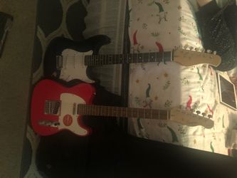 2 electrical guitars and 1 amp