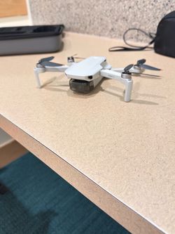 DJI Mini SE Drone Bundle — 2 Batteries + Controller + Case + Charger