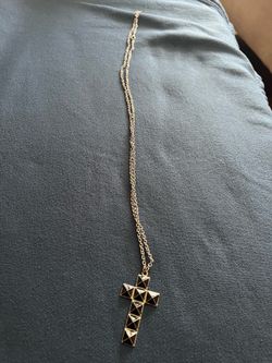 It’s A Beautiful cross with long chain it’s custom jewelry