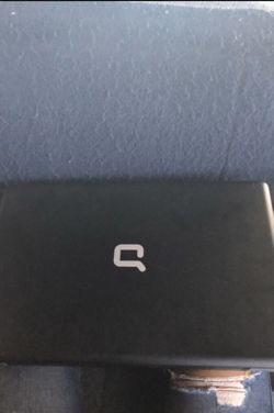 Black compaq laptop