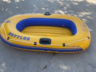 a Sevylor Caravelle K65 3-person inflatable pool and beach boat measuring 8 feet (2.40 meters)