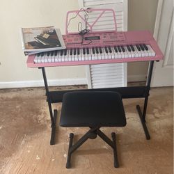 Like new Pink Piano Keyboard &Book & Stool $65