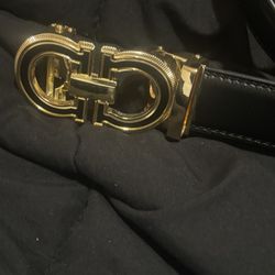 Gold And Black Leather Belt With Shiny Buckle 