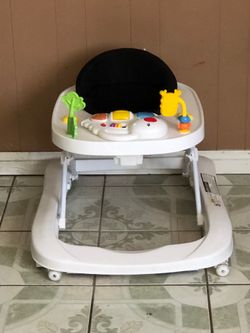 PRACTICALLY NEW BABY JOY WALKER MUSIC LIGHTS AND SONGS WORKS!!!!