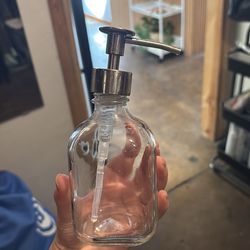 2 small glass dispenser jars