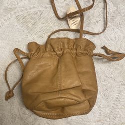 Round Drawstring Genuine Leather Pouch .