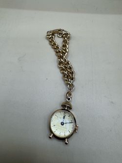 Vintage Sorvereign Swiss manual wind pendant miniature alarm clock watch