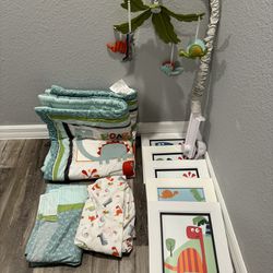 Matching Baby dinosaur pictures, sheets, comforter, mobile $80