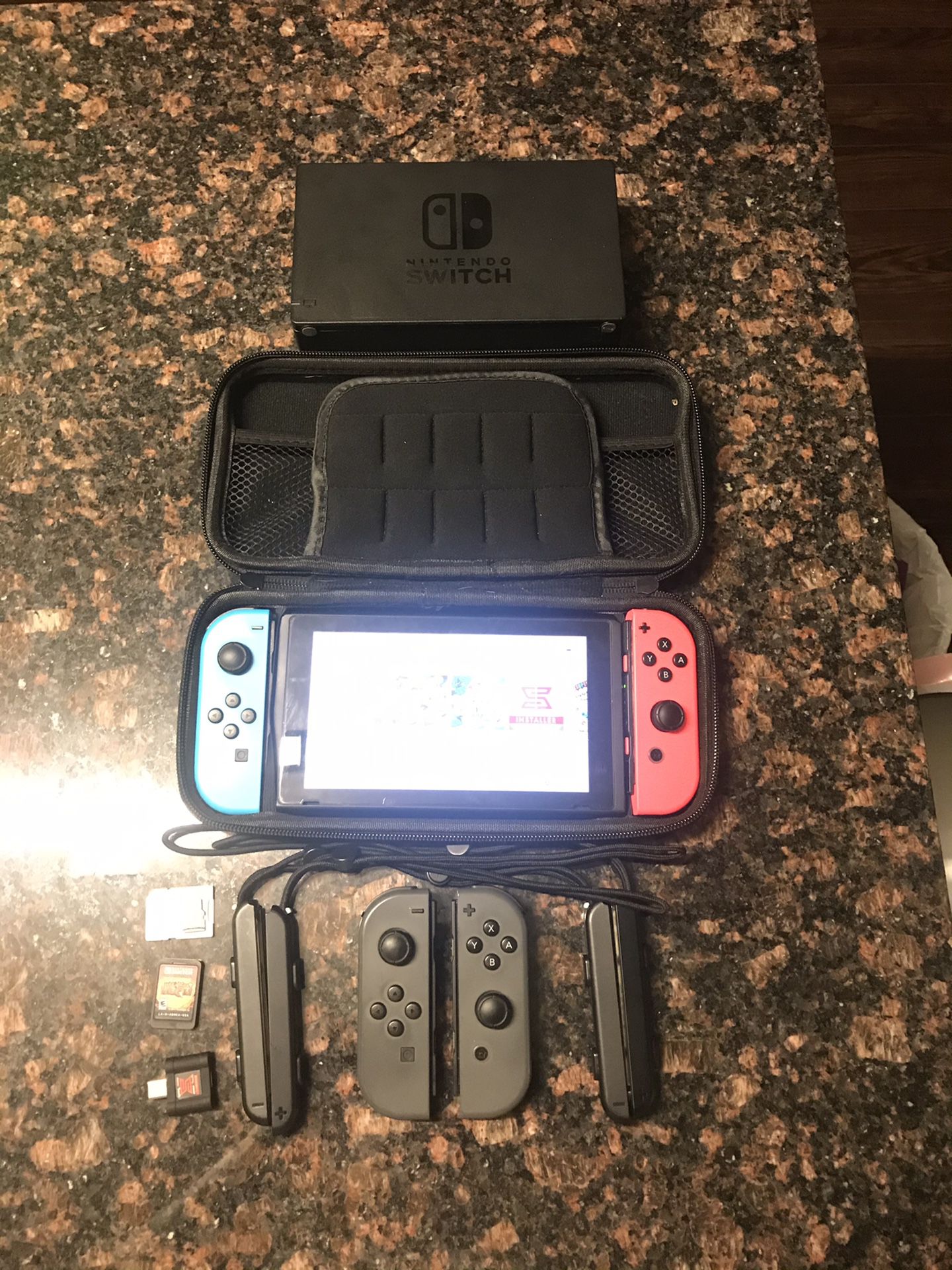 Nintendo Switch 4 controllers, sxOS, over 10 games (Mario Party, Odyssey, Cart, Arms, Mortal kombat and more , SD cards (128GB and 64GB)