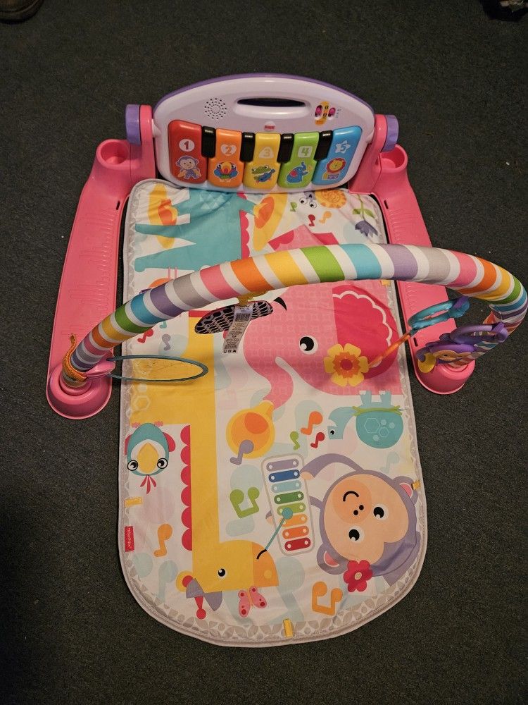  Fisher price kick and play piano gym